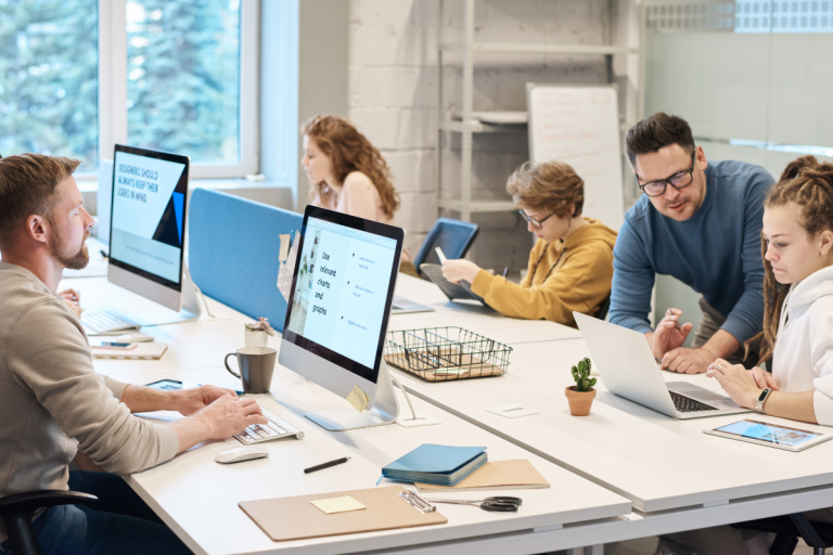 An office where a team are all working on computers