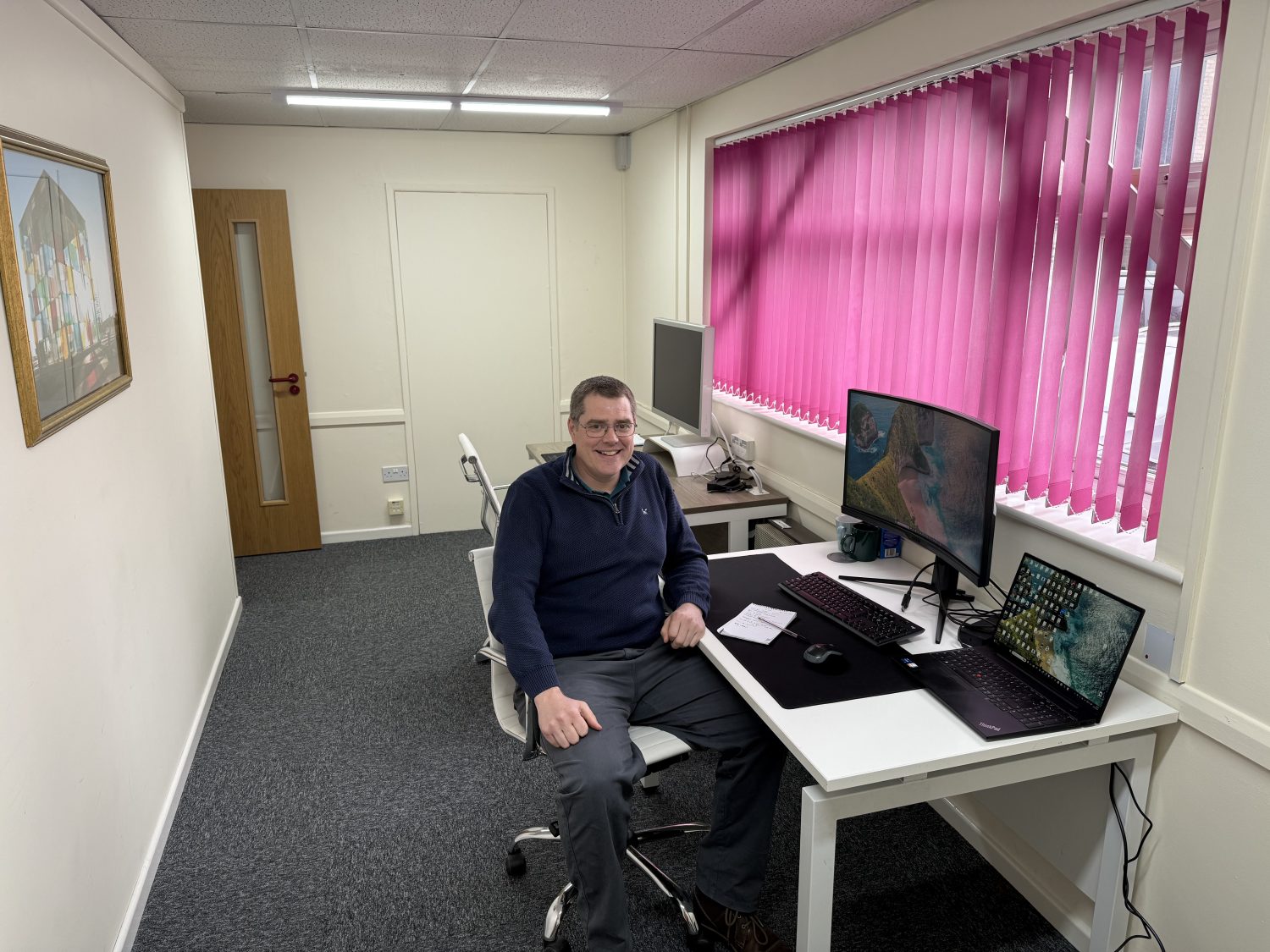 Andy at his new desk