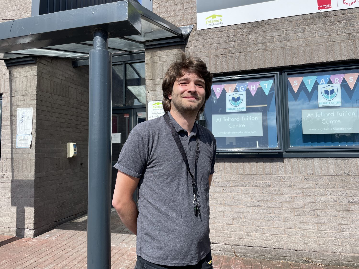 Matt Foster standing outside the office