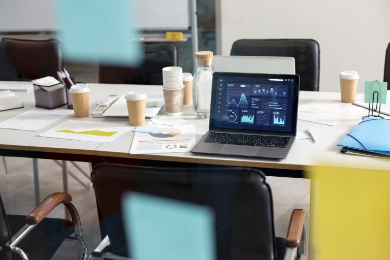 Laptop displaying business IT analytics on a desk, representing local IT support services in Shropshire for small businesses.
